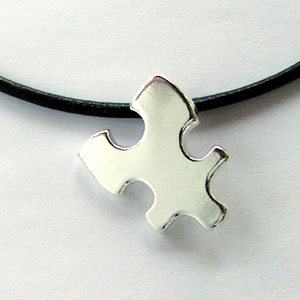 Puzzle Piece Pendant - Leather Cord